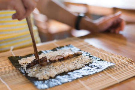 prepare and make homemade sushi on the table at homeの写真素材