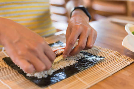 prepare and make homemade sushi on the table at homeの写真素材