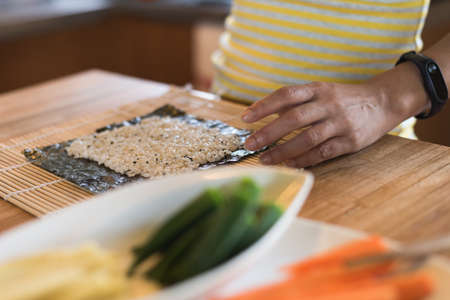 prepare and make homemade sushi on the table at homeの写真素材