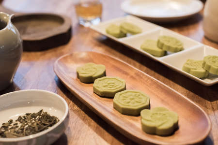 green mooncake on table at Chinese Mid Autumn Festivalの写真素材