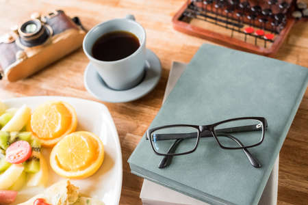 morning working with breakfast on table with nobodyの写真素材