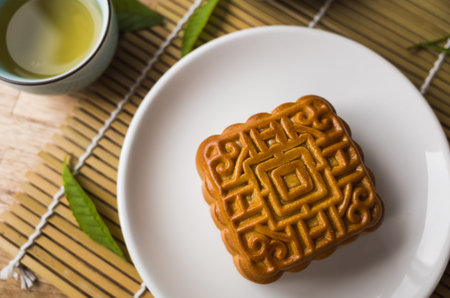 Chinese mid autumn festival food of mooncake with tea