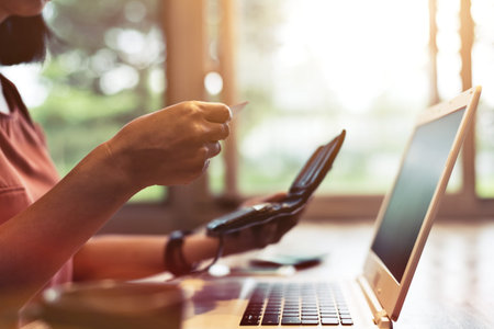 woman using a credit card, concept of payment or shopping