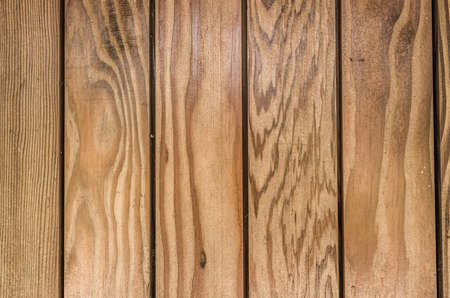 old and aged wooden textured background in brownの写真素材