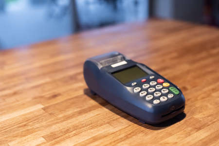 using a credit card machine, concept of payment or shoppingの写真素材