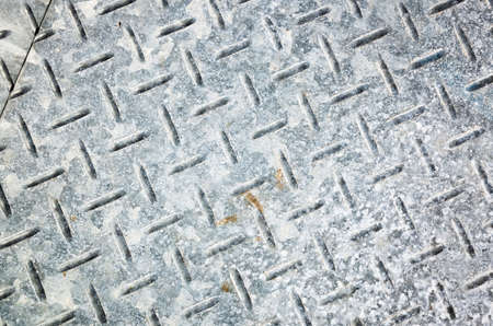 background of metal diamond plate in gray colorの写真素材