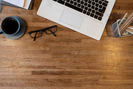 glasses on the notebook on the table, concept of plan, business, workingの写真素材