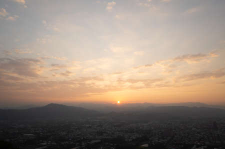 sunset scenery with orange clouds and sky at the Puli town, Nantou, Taiwanの写真素材