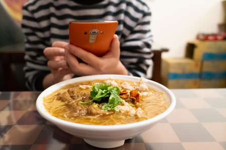 thin noodles with pork intestine, famous and traditional Taiwan snacksの写真素材
