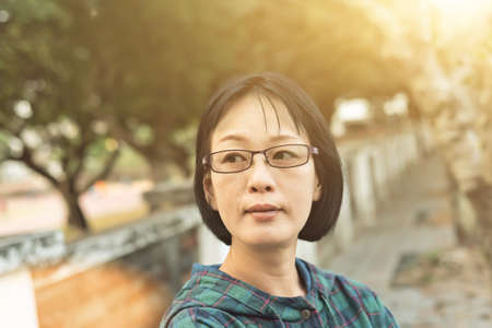 portrait of Asian mature woman at the streetの写真素材