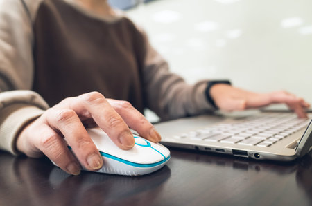 closeup image of woman working at a coffee shop