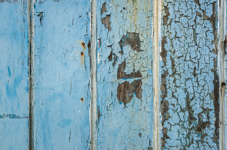 old wooden fence background painted in blue backgroundの写真素材