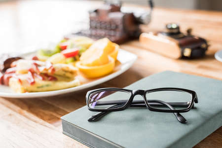 morning working with breakfast on table with nobodyの写真素材