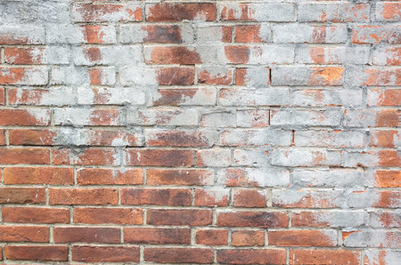 background of red bricks wall with gray cement