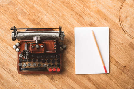 blank note book with typewriter on the desk at homeの写真素材