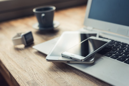 smart phone on the table with nobody, concept of working at home