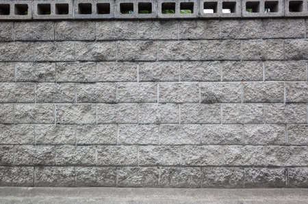 gray brick wall background with copy space