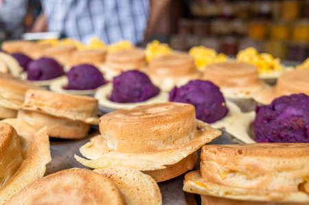 traditional Taiwanese snacks of wheel pies in red beans and taroの写真素材