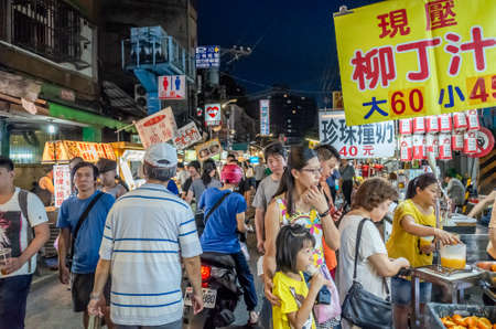 Taipei, Taiwan - Jun 8th, 2019: people walk and shop in a night marketplace at Taipei, Taiwan, Asiaのeditorial素材