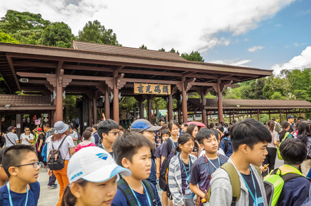 Nantou, Taiwan - May 30th, 2019: tourists and boats at Xuanguang temple pier in Sun Moon Lake, Nantou, Taiwanのeditorial素材