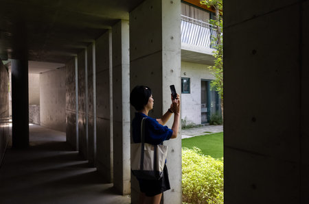 Nantou, Taiwan - June 20th, 2019: traveling Asian woman in Yuhsiu Museum Art at Caotun, Nantou,...