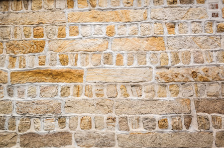 aged yellow brick wall with good texture