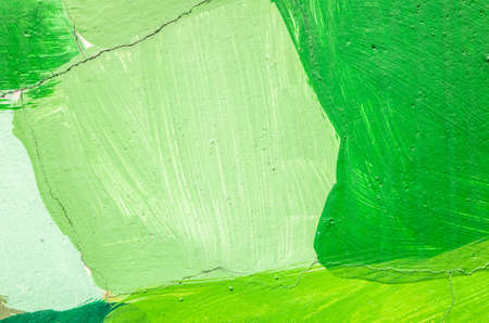 colorful wall with green painted on a cement backgroundの写真素材