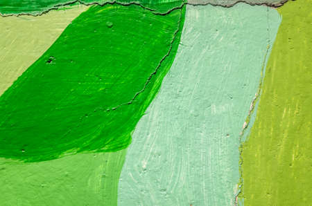 colorful wall with green painted on a cement backgroundの写真素材