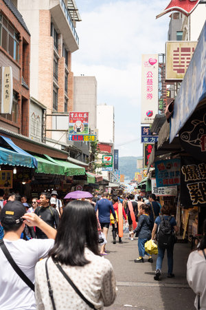 Nantou, Taiwan - September first, 2019: people walk at the marketplace street at Sun Moon Lake...