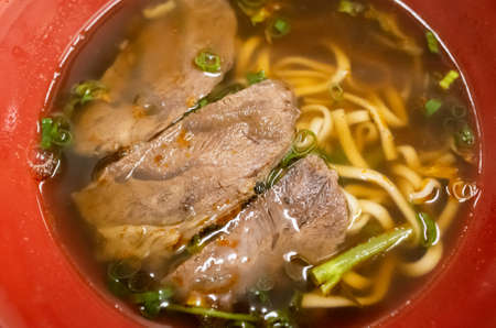 eating beef noodle soup at Taiwan, closeup imagesの写真素材