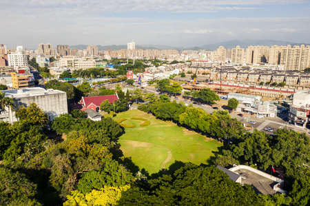 Taichung, Taiwan - November 21th, 2019: cityscape with trees in Taichung Park at Taichung City, Taiwan, Asiaのeditorial素材