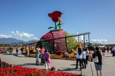Xinshe, Taiwan - November 28th, 2019: tourists and flowers at Xinshe flower festival, Taichung, Taiwanのeditorial素材