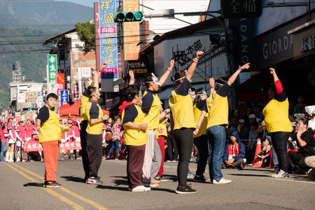 Puli, Taiwan - December 14th, 2019: people parade in Puli carnival at Nantou, Taiwan