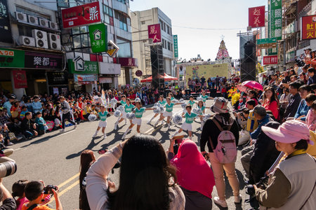 Puli, Taiwan - December 14th, 2019: people parade in Puli carnival at Nantou, Taiwan