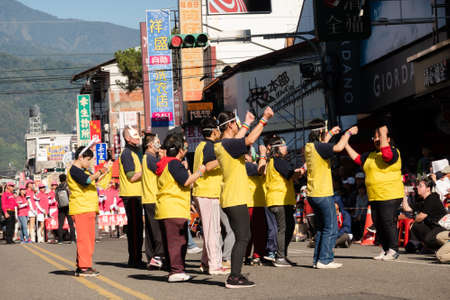 Puli, Taiwan - December 14th, 2019: people parade in Puli carnival at Nantou, Taiwanのeditorial素材