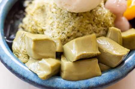 eating shaved ice with colorful dessert, famous Taiwanese snacks at Taiwan