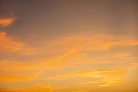 colorful sunset clouds over sky, background of nature cloudy heavenの写真素材