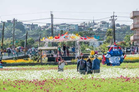 Daxi, Taiwan - November 15th, 2019: tourists walk at the garden in Daxi event of Taoyuan Flower Festival in Taoyuan, Taiwan, Asiaのeditorial素材