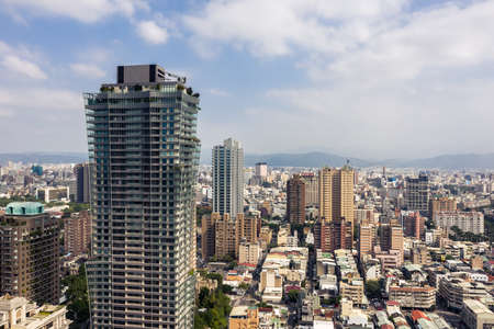 Taichung, Taiwan - November 21th, 2019: cityscape of Taichung city with skyscrapers and blue sky at Taichung City, Taiwan, Asiaのeditorial素材