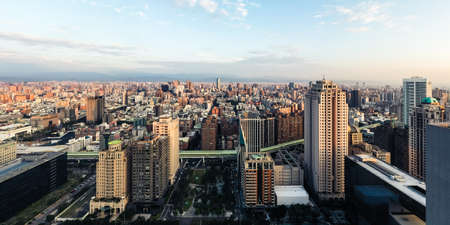 Taichung, Taiwan - November 21th, 2019: panoramic cityscape of Taichung city with skyscrapers and blue sky at Taichung City, Taiwan, Asiaのeditorial素材