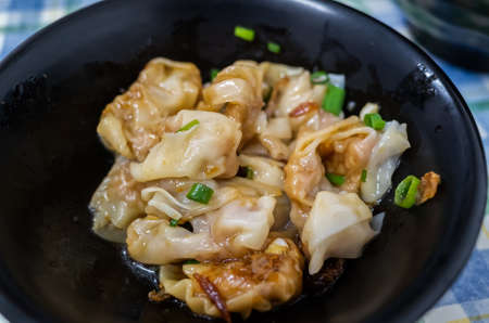 taiwanese special snack of spicy wontons in the restaurantの写真素材