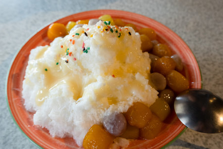 eating shaved ice with colorful dessert, famous Taiwan snacksの写真素材