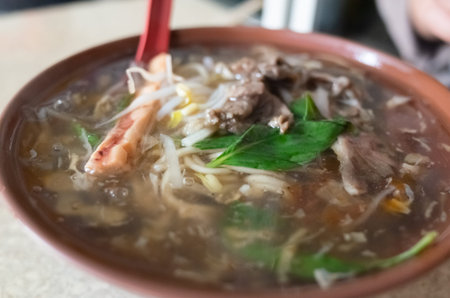 Taiwanese thickened soup noodle with lamb and squid potage