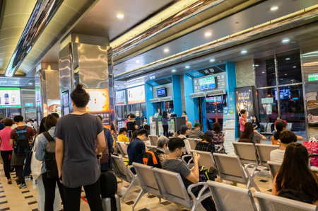 Taipei, Taiwan - Jun 6th, 2019: people with Taipei long distance bus station building at Taipei,...
