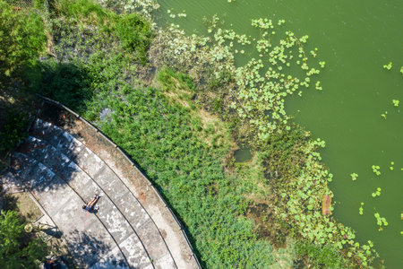 aerial view of Asian woman sit on ground in the outdoor