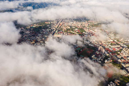 Puli, Nantou-Jan 2nd, 2020: aerial view of Puli cityscape with clouds over the city, Nantou county, Taiwanのeditorial素材