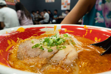 hot spicy ramen, close up images of noodles with soup in restaurantの写真素材