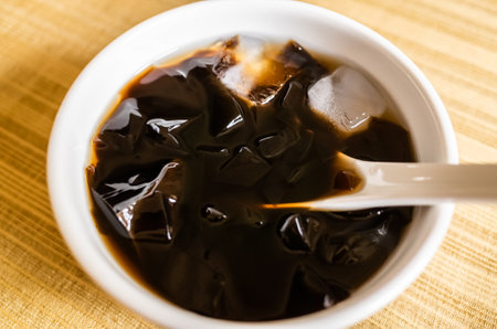 traditional Taiwanese snacks of mesona black herbal tea in a bowlの写真素材