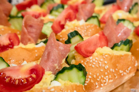 sandwiches with pork and bread on the deskの写真素材