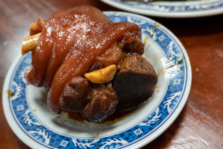 taiwanese braised pork feet, traditional food in a restaurantの写真素材